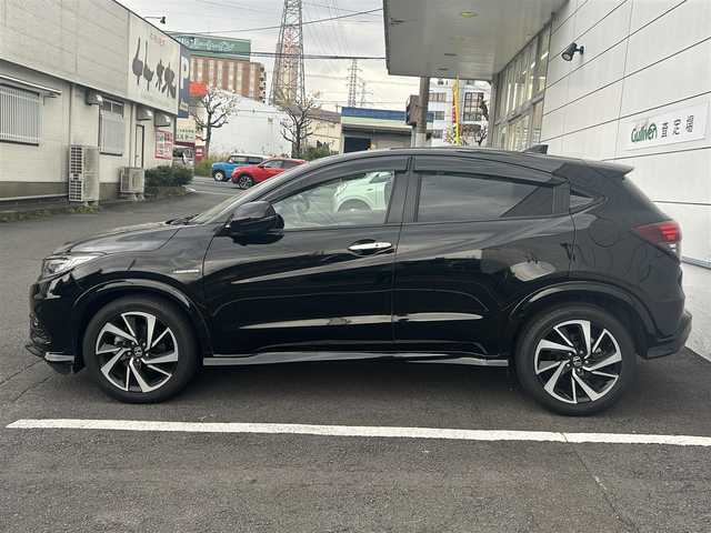 ホンダ ヴェゼル ハイブリッド RS ホンダセンシング 長崎県 2019(令1)年 6.3万km クリスタルブラックパール 純正8インチナビ/（CD/DVD/BT/フルセグ）/バックカメラ/衝突軽減システム/レーンアシスト/ハーフレザーシート/シートヒーター/パドルシフト/レーダークルーズ/ETC/オートライト/純正18インチAW