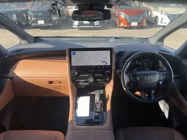 トヨタ ヴェルファイア ハイブリット Z プレミア 福島県 2023(令5)年 1.4万km ブラック セーフティセンス/・プリクラッシュセーフティ/・レーンディパーチャーアラート/・全車速追従機能付レーダークルーズコントロール/・アダプティブハイビームシステム/・ロードサインアシスト/・プロアクティブドライビングアシスト/14インチディスプレイオーディオプラス/【Bluetooth/フルセグTV/HDMI】/・コネクティッドナビ/・10スピーカー/・ETC2.0/・Apple Car Play/Android auto/茶レザーシート/・パワーシート（全席）/・シートヒーター（全席）/・エアシート（全席）/左右独立ムーンルーフ/トヨタチームメイト/パノラミックビューモニター/両側パワースライドドア/・オートステップ/スマートキー/・プッシュスタート/・スペアキー/3眼LEDヘッドライト/取扱説明書/新車時保証書