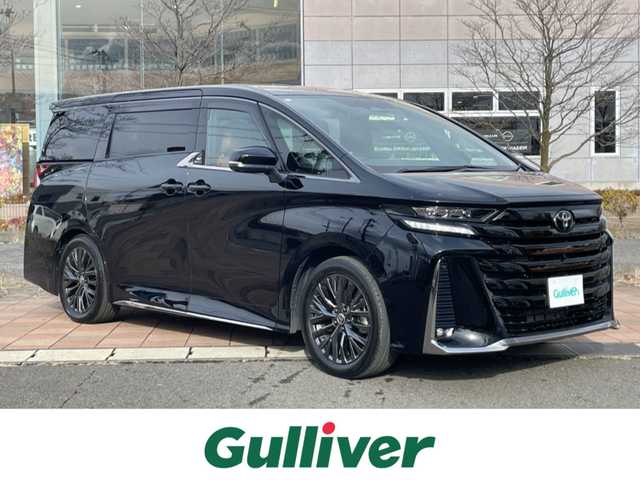 トヨタ ヴェルファイア ハイブリット Z プレミア 福島県 2023(令5)年 1.4万km ブラック セーフティセンス/・プリクラッシュセーフティ/・レーンディパーチャーアラート/・全車速追従機能付レーダークルーズコントロール/・アダプティブハイビームシステム/・ロードサインアシスト/・プロアクティブドライビングアシスト/14インチディスプレイオーディオプラス/【Bluetooth/フルセグTV/HDMI】/・コネクティッドナビ/・10スピーカー/・ETC2.0/・Apple Car Play/Android auto/茶レザーシート/・パワーシート（全席）/・シートヒーター（全席）/・エアシート（全席）/左右独立ムーンルーフ/トヨタチームメイト/パノラミックビューモニター/両側パワースライドドア/・オートステップ/スマートキー/・プッシュスタート/・スペアキー/3眼LEDヘッドライト/取扱説明書/新車時保証書
