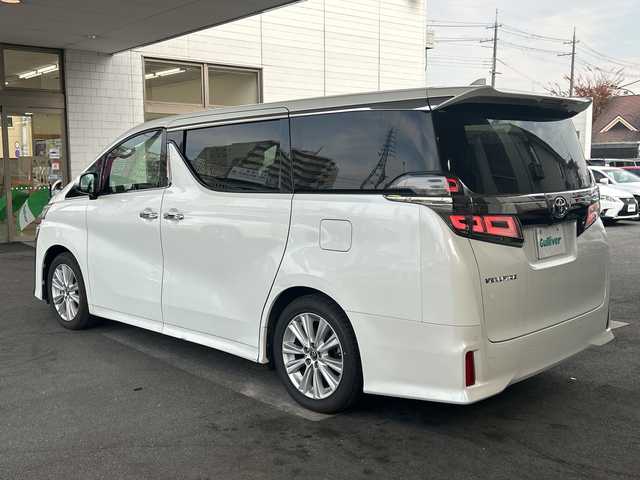 トヨタ ヴェルファイア Z 京都府 2018(平30)年 4.2万km ホワイトパールクリスタルシャイン 純正10.5インチナビ/11.4インチフリップダウンモニター/フルセグテレビ/走行中視聴可能/DVD視聴可能/Bluetooth/HDMI/サンルーフ/両側パワースライドドア/トヨタセーフティーセンス/クリアランスソナー/レーダークルーズコントロール/ロードサインアシスト/プリクラシュセーフティー/レーンキープアシスト/ブレーキホールド/オールオートウィンド/禁煙車/ビルトインETC/フォグランプ/ウィンカーミラー/電動格納ミラー/スタッドレスタイヤ有