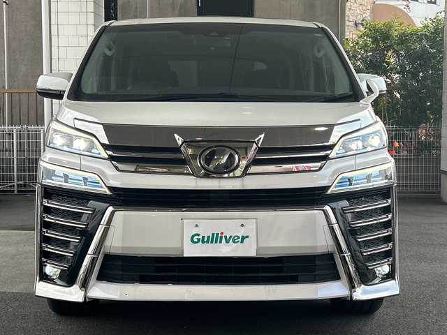トヨタ ヴェルファイア Z 京都府 2018(平30)年 4.2万km ホワイトパールクリスタルシャイン 純正10.5インチナビ/11.4インチフリップダウンモニター/フルセグテレビ/走行中視聴可能/DVD視聴可能/Bluetooth/HDMI/サンルーフ/両側パワースライドドア/トヨタセーフティーセンス/クリアランスソナー/レーダークルーズコントロール/ロードサインアシスト/プリクラシュセーフティー/レーンキープアシスト/ブレーキホールド/オールオートウィンド/禁煙車/ビルトインETC/フォグランプ/ウィンカーミラー/電動格納ミラー/スタッドレスタイヤ有
