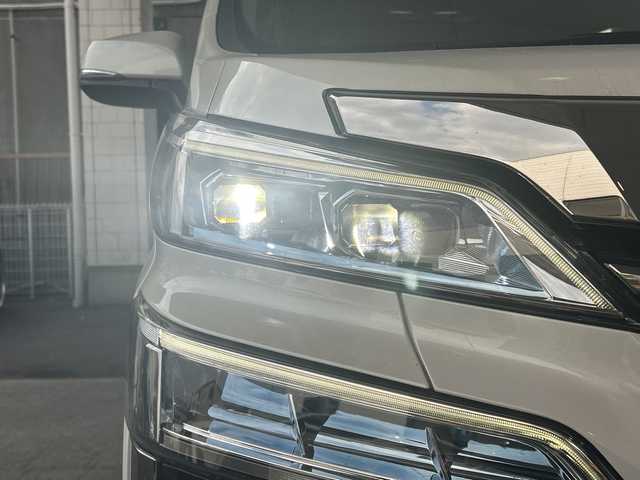 トヨタ ヴェルファイア Z 京都府 2018(平30)年 4.2万km ホワイトパールクリスタルシャイン 純正10.5インチナビ/11.4インチフリップダウンモニター/フルセグテレビ/走行中視聴可能/DVD視聴可能/Bluetooth/HDMI/サンルーフ/両側パワースライドドア/トヨタセーフティーセンス/クリアランスソナー/レーダークルーズコントロール/ロードサインアシスト/プリクラシュセーフティー/レーンキープアシスト/ブレーキホールド/オールオートウィンド/禁煙車/ビルトインETC/フォグランプ/ウィンカーミラー/電動格納ミラー/スタッドレスタイヤ有