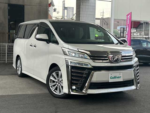 トヨタ ヴェルファイア Z 京都府 2018(平30)年 4.2万km ホワイトパールクリスタルシャイン 純正10.5インチナビ/11.4インチフリップダウンモニター/フルセグテレビ/走行中視聴可能/DVD視聴可能/Bluetooth/HDMI/サンルーフ/両側パワースライドドア/トヨタセーフティーセンス/クリアランスソナー/レーダークルーズコントロール/ロードサインアシスト/プリクラシュセーフティー/レーンキープアシスト/ブレーキホールド/オールオートウィンド/禁煙車/ビルトインETC/フォグランプ/ウィンカーミラー/電動格納ミラー/スタッドレスタイヤ有