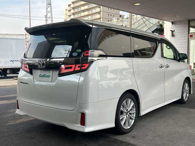 トヨタ ヴェルファイア Z 京都府 2018(平30)年 4.2万km ホワイトパールクリスタルシャイン 純正10.5インチナビ/11.4インチフリップダウンモニター/フルセグテレビ/走行中視聴可能/DVD視聴可能/Bluetooth/HDMI/サンルーフ/両側パワースライドドア/トヨタセーフティーセンス/クリアランスソナー/レーダークルーズコントロール/ロードサインアシスト/プリクラシュセーフティー/レーンキープアシスト/ブレーキホールド/オールオートウィンド/禁煙車/ビルトインETC/フォグランプ/ウィンカーミラー/電動格納ミラー/スタッドレスタイヤ有