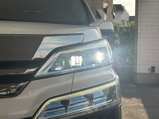 トヨタ ヴェルファイア Z 京都府 2018(平30)年 4.2万km ホワイトパールクリスタルシャイン 純正10.5インチナビ/11.4インチフリップダウンモニター/フルセグテレビ/走行中視聴可能/DVD視聴可能/Bluetooth/HDMI/サンルーフ/両側パワースライドドア/トヨタセーフティーセンス/クリアランスソナー/レーダークルーズコントロール/ロードサインアシスト/プリクラシュセーフティー/レーンキープアシスト/ブレーキホールド/オールオートウィンド/禁煙車/ビルトインETC/フォグランプ/ウィンカーミラー/電動格納ミラー/スタッドレスタイヤ有