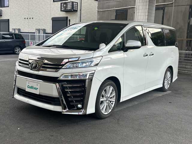 トヨタ ヴェルファイア Z 京都府 2018(平30)年 4.2万km ホワイトパールクリスタルシャイン 純正10.5インチナビ/11.4インチフリップダウンモニター/フルセグテレビ/走行中視聴可能/DVD視聴可能/Bluetooth/HDMI/サンルーフ/両側パワースライドドア/トヨタセーフティーセンス/クリアランスソナー/レーダークルーズコントロール/ロードサインアシスト/プリクラシュセーフティー/レーンキープアシスト/ブレーキホールド/オールオートウィンド/禁煙車/ビルトインETC/フォグランプ/ウィンカーミラー/電動格納ミラー/スタッドレスタイヤ有