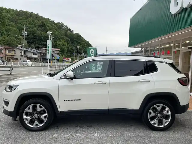 クライスラー・ジープ ジープ コンパス リミテッド 栃木県 2019(平31)年 4.6万km パール 純正メモリナビ/AM FM TV AUX BT/バックカメラ/オート４WD/追従式クルーズコントロール/ETC/電動リアゲート/前後ドライブレコーダー/純正フロアマット/前席シートヒーター/ハーフレザー/純正アルミホイール/コーナーセンサー/オートライト