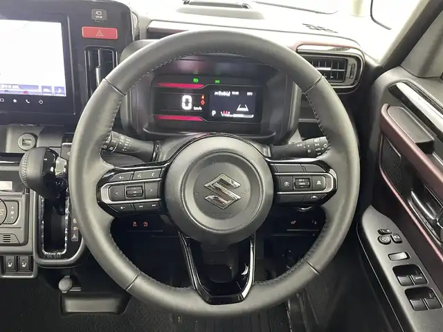 スズキ スペーシア カスタム HYBRID XS 熊本県 2024(令6)年 1.2万km ブルーイッシュブラックパール3 純正ディスプレイオーディオ　/全周囲カメラ　/両側パワースライドドア　/前席シートヒーター　/ステアリングヒーター/スズキセーフティサポート/・デュアルセンサーブレーキサポート/・誤発進制御機能/・後方誤発進抑制機能/・車線逸脱警報/・車線逸脱抑制機能/・ふらつき警報機能/・車線維持支援システム/・先行車発進お知らせ機能/・標識認識システム/・レーダークルーズコントロール/衝突軽減ブレーキ　/アイドリングストップ　/横滑り防止　/社外フロアマット/純正１５インチAW/オートライト　/ＬＥＤヘッドライト/スマートキー/プッシュスタート