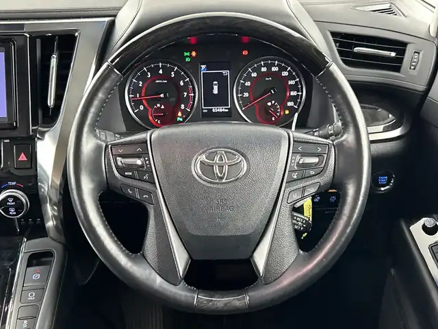 トヨタ ヴェルファイア Z Gエディション 愛知県 2018(平30)年 6.6万km ブラック 純正9インチナビ（AM/FM/フルセグ/BT/CD/DVD）/サンルーフ/電動リアゲート/純正18インチアルミホイール/レザーシート/D/N席シートヒーター・クーラー/D/N席パワーシート/D席シートメモリー/レーダークルーズコントロール/LEDヘッドライト/両側パワースライドドア/バックカメラ/レーントレーシングアシスト/クリアランスソナー/プリクラッシュセーフティ/ロードサインアシスト/ステアリングヒーター/オートハイビーム/オートライト/MTモード付AT/スマートキー/プッシュスタート/電動格納ミラー/純正フロアマット/ビルトインETC