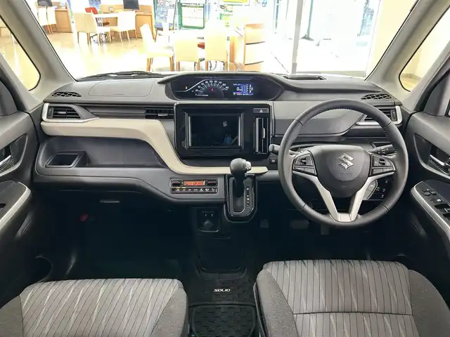スズキ ソリオ HV MZ 道央・札幌 2023(令5)年 7.9万km ピュアホワイトP ・ワンオーナー/・衝突軽減ブレーキ/・横滑り防止装置/・車線逸脱警報/・アイドリングストップ/・ヘッドアップディスプレイ/・レーダークルーズコントロール/・両側パワースライドドア/・前席シートヒーター/・ミラーヒーター/・ＥＴＣ/・純正15インチＡＷ/・プッシュスタート/・スマートキー/オーディオレス車両