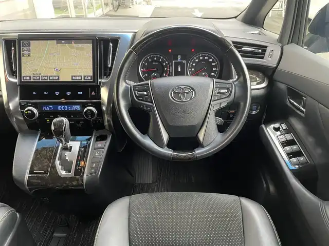 トヨタ ヴェルファイア Z Aエディション ゴールデンアイズ 埼玉県 2016(平28)年 4.8万km ブラック /純正10.5型メモリナビ//フルセグTV//バックカメラ//フリップダウンモニター//CD/DVD/Bluetooth//両側パワースライドドア//パワーバックドア//アダプティブクルーズコントロール//ビルトインETC//スマートキー//LEDヘッドライト//衝突軽減ブレーキ//クリアランスソナー//W.サイドエアバッグ//カーテン.ニーエアバッグ//ABS//横滑り防止装置//ハーフレザーシート//助手席&2列目オットマン//オートライト//Fフォグランプ//コンビステアリング//スモークフィルム//ドアバイザー//純正18インチAW//新車時保証書//取扱説明書//ナビ取説
