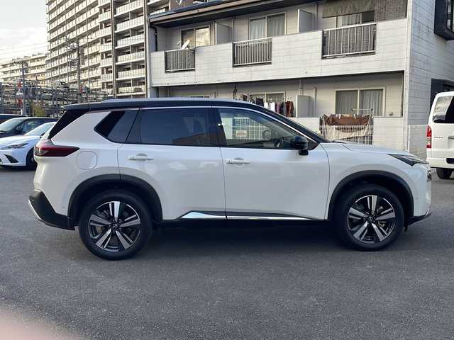 日産 エクストレイル G e－4ORCE 宮崎県 2023(令5)年 2.1万km ブリリアントホワイトパール/スーパーブラック 2トーン ディスプレイオーディオ Bluetooth USB入力端子 全方位カメラ フルセグTV ETC 前後ドライブレコーダー BSM レーダークルーズコントロール BOSEサウンド ヘッドアップディスプレイ ハンドルヒーター 前席シートヒーター 置くだけ充電