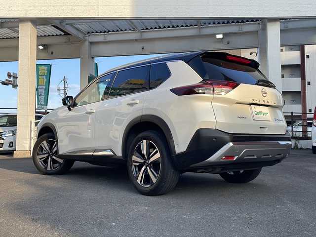 日産 エクストレイル G e－4ORCE 宮崎県 2023(令5)年 2.1万km ブリリアントホワイトパール/スーパーブラック 2トーン ディスプレイオーディオ Bluetooth USB入力端子 全方位カメラ フルセグTV ETC 前後ドライブレコーダー BSM レーダークルーズコントロール BOSEサウンド ヘッドアップディスプレイ ハンドルヒーター 前席シートヒーター 置くだけ充電