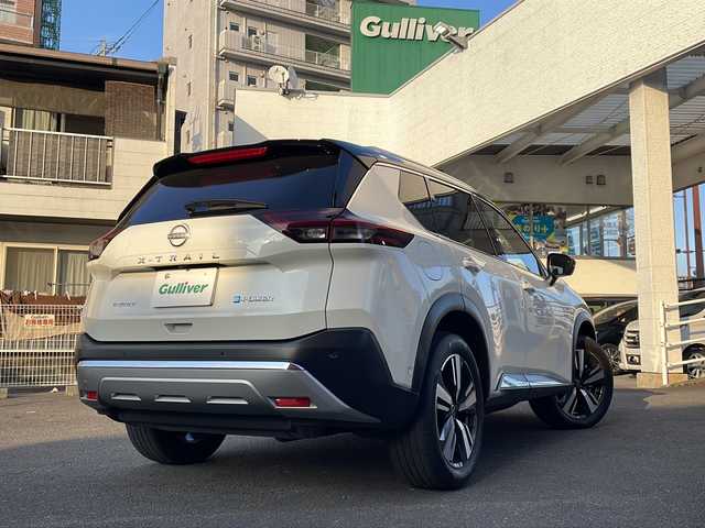日産 エクストレイル G e－4ORCE 宮崎県 2023(令5)年 2.1万km ブリリアントホワイトパール/スーパーブラック 2トーン ディスプレイオーディオ Bluetooth USB入力端子 全方位カメラ フルセグTV ETC 前後ドライブレコーダー BSM レーダークルーズコントロール BOSEサウンド ヘッドアップディスプレイ ハンドルヒーター 前席シートヒーター 置くだけ充電