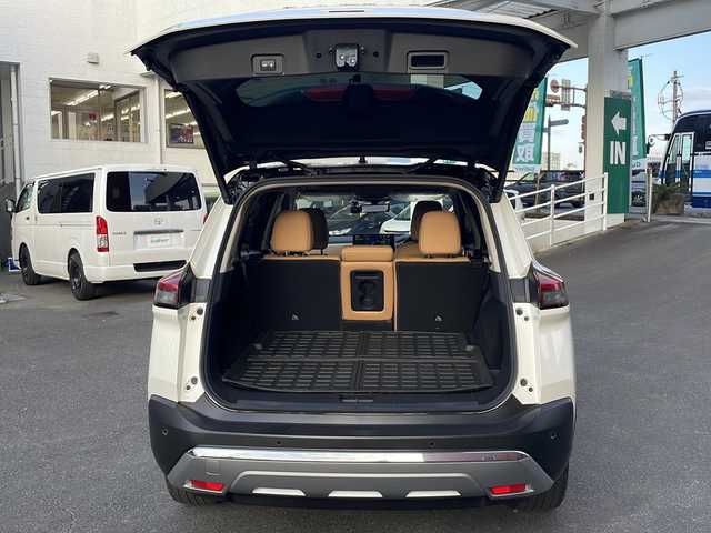 日産 エクストレイル G e－4ORCE 宮崎県 2023(令5)年 2.1万km ブリリアントホワイトパール/スーパーブラック 2トーン ディスプレイオーディオ Bluetooth USB入力端子 全方位カメラ フルセグTV ETC 前後ドライブレコーダー BSM レーダークルーズコントロール BOSEサウンド ヘッドアップディスプレイ ハンドルヒーター 前席シートヒーター 置くだけ充電