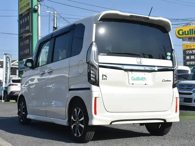 ホンダ Ｎ ＢＯＸ カスタム G L ホンダセンシング 神奈川県 2018(平30)年 1.9万km プレミアムホワイトパールⅡ ホンダ純正8型ナビ/：CD/DVD/：地デジ/：Bluetooth/：USB入力/バックカメラ/ホンダ純正ドラレコ/ホンダ純正ビルトインETC/左右パワースライド/LEDヘッドランプ/：LEDフォグランプ/充電用USBあり/ホンダセンシング/：衝突軽減ブレーキ/：誤発信抑制機能（前後）/：歩行者事故低減ステアリング/：先行車発進お知らせ/：車線維持支援システム/：オートハイビーム/：標識認識/：路外逸脱抑制機能/プッシュスタート/：スマートキー2個/ーーーーーーーーーーーーーーーーーー/保証書/取説/ナビ説/記録簿 H30.R1.2.3.4.5.6