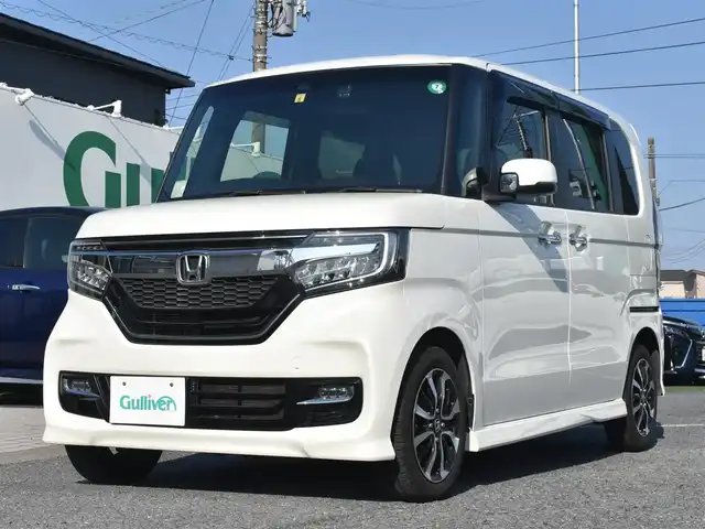 ホンダ Ｎ ＢＯＸ カスタム G L ホンダセンシング 神奈川県 2018(平30)年 1.9万km プレミアムホワイトパールⅡ ホンダ純正8型ナビ/：CD/DVD/：地デジ/：Bluetooth/：USB入力/バックカメラ/ホンダ純正ドラレコ/ホンダ純正ビルトインETC/左右パワースライド/LEDヘッドランプ/：LEDフォグランプ/充電用USBあり/ホンダセンシング/：衝突軽減ブレーキ/：誤発信抑制機能（前後）/：歩行者事故低減ステアリング/：先行車発進お知らせ/：車線維持支援システム/：オートハイビーム/：標識認識/：路外逸脱抑制機能/プッシュスタート/：スマートキー2個/ーーーーーーーーーーーーーーーーーー/保証書/取説/ナビ説/記録簿 H30.R1.2.3.4.5.6