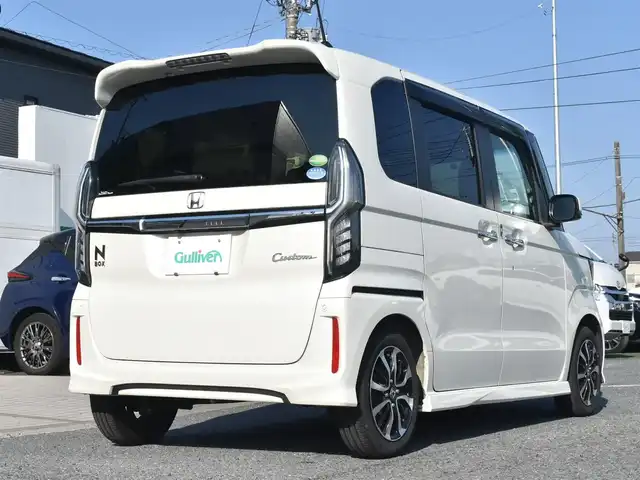 ホンダ Ｎ ＢＯＸ カスタム G L ホンダセンシング 神奈川県 2018(平30)年 1.9万km プレミアムホワイトパールⅡ ホンダ純正8型ナビ/：CD/DVD/：地デジ/：Bluetooth/：USB入力/バックカメラ/ホンダ純正ドラレコ/ホンダ純正ビルトインETC/左右パワースライド/LEDヘッドランプ/：LEDフォグランプ/充電用USBあり/ホンダセンシング/：衝突軽減ブレーキ/：誤発信抑制機能（前後）/：歩行者事故低減ステアリング/：先行車発進お知らせ/：車線維持支援システム/：オートハイビーム/：標識認識/：路外逸脱抑制機能/プッシュスタート/：スマートキー2個/ーーーーーーーーーーーーーーーーーー/保証書/取説/ナビ説/記録簿 H30.R1.2.3.4.5.6