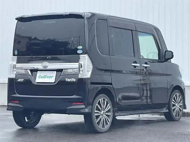 ダイハツ タント カスタム RS トップED SA 愛媛県 2015(平27)年 7.6万km ブラックマイカメタリック 社外ナビ（Bluetooth/SD/CD/DVD/ワンセグTV)/バックカメラ/両側パワースライドドア/ハーフレザーシート/ETC/社外16インチアルミホイール/純正フロアマット/純正ドアバイザー/LEDヘッドライト/フォグランプ/ABS/レーンキープアシスト/横滑り防止装置/盗難防止装置/衝突被害軽減ブレーキ/取扱説明書