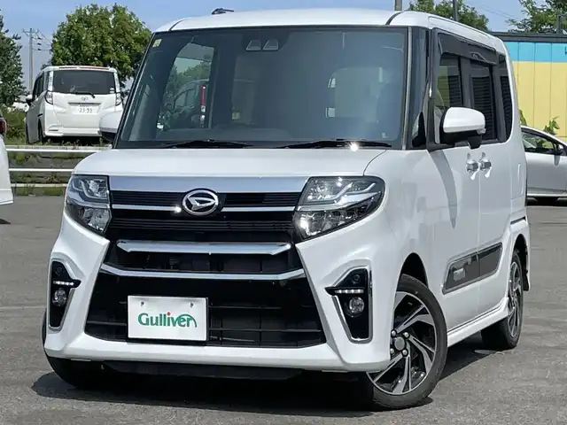 ダイハツ タント カスタム RS スタイルセレクション 道央・札幌 2021(令3)年 0.6万km シャイニングホワイトパール ４WD/純正ディーラーOPナビ/CD/DVD/BT/フルセグ/スマートアシスト/衝突被害軽減ブレーキ/横滑り防止装置/レーダークルーズコントロール/レーンキープアシスト/コーナーセンサー/バックカメラ/ビルトインETC/アイドリングストップ/PWRMODE/両側パワースライドドア/前席シートヒーター/革巻きステアリング/ステアリングリモコン/プッシュスタート/スマートキー/LEDヘッドライト/オートライト/オートハイビーム/フォグランプ/電動格納ミラー/ウィンカーミラー/フロアマット/ドアバイザー/スペアキー/純正エンジンスターター