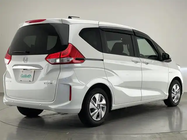 ホンダ フリード ハイブリット G ホンダセンシング 愛知県 2022(令4)年 3.7万km プラチナホワイトパール 純正ナビ　両側パワスラ　禁煙車　フルセグＴＶ　ＤＶＤ再生　ＥＴＣ　追従クルコン　ドラレコ　コーナーセンサー　車線逸脱　衝突軽減　バックカメラ　ＵＳＢ　ＬＥＤオートライト　シートヒーター　スマートキー　プッシュスタート　Cパッケージ