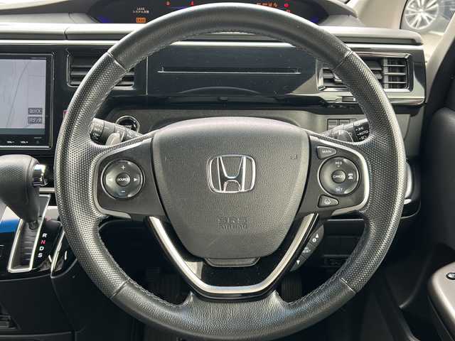 ホンダ ステップワゴン モデューロX 岐阜県 2017(平29)年 10.8万km プレミアムスパークルブラックパール 登録時走行距離107154km/純正１０型ナビ/純正後席モニター/フルセグテレビ/バックカメラ/Blue tooth・CD・DVD・iPod・SDミュージックサーバー/ETC/両側パワースライドドア/衝突被害軽減システム/ドライブレコーダー前方/レーンキープアシスト/レーダークルーズコントロール/プッシュスタート/スマートキー/ハーフレザーシート/オートライト