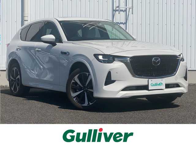 マツダ ＣＸ－６０ XD HV プレミアムモダン 熊本県 2022(令4)年 6.6万km ロジウムホワイトプレミアムメタリック 純正SDナビ/・AM/FM/USB/BT/HDMI/・アップルカープレイ/アンドロイドオート/・フルセグTV/全周囲カメラ/衝突軽減ブレーキ/オートハイビーム/車線逸脱防止装置/誤発進抑制機能/レーダークルーズコントロール/標識認識機能/ブラインドスポットモニター/ヘッドアップディスプレイ/置くだけ充電/前席パワーシート/D席メモリ付き/全席シートヒーター（前のみクーラー付き）/パワーバックドア/革巻きステアリング/パドルシフト/ステアリングヒーター/ETC/LEDヘッドライト/前後ドライブレコーダー/電動格納ミラー/・ウインカーミラー/純正フロアマット/純正アルミホイール/スペアキー
