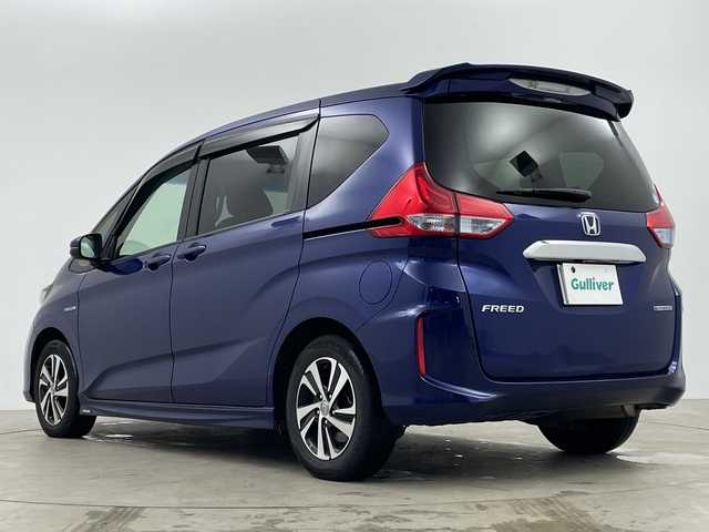 ホンダ フリード ハイブリット G ホンダセンシング 鹿児島県 2017(平29)年 11.2万km コバルトブルーパール 純正SDナビ/(BT/AM/FM/CD/DVD/フルセグTV)/ワンオーナー/ホンダセンシング/先行車発進お知らせ機能/誤発進抑制機能/標識認識機能/レーダークルーズコントロール/レーンキープアシスト/両側パワースライドドア/バックカメラ/ハーフレザーシート/衝突軽減ブレーキ/アイドリングストップ/ウォークスルー/純正LEDヘッドライト/純正フロアマット/3列シート/保証書/取扱説明書
