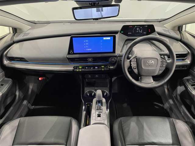 トヨタ プリウス Z 愛知県 2023(令5)年 2.3万km プラチナホワイトパールマイカ 純正１２．３インチディスプレイオーディオ/ＧＲフロントスポイラー/パノラミックビューモニター/衝突軽減ブレーキ/レーダークルーズコントロール/クリアランスソナー/ブラインドスポットモニター/レーンディパーチャーアラート/パワーバックドア/デジタルインナーミラー/ＥＴＣ２．０/置くだけ充電/シートヒーター/エアシート/パワーシート/シートメモリー/ハンドルヒーター/電動パーキング/AC100V【1500W】