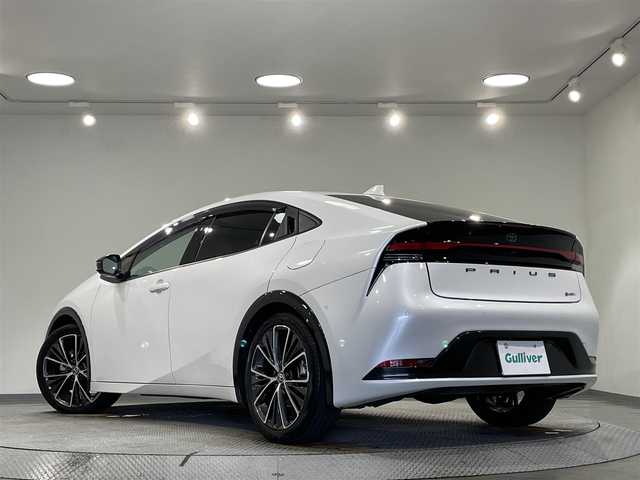 トヨタ プリウス Z 愛知県 2023(令5)年 2.3万km プラチナホワイトパールマイカ 純正１２．３インチディスプレイオーディオ/ＧＲフロントスポイラー/パノラミックビューモニター/衝突軽減ブレーキ/レーダークルーズコントロール/クリアランスソナー/ブラインドスポットモニター/レーンディパーチャーアラート/パワーバックドア/デジタルインナーミラー/ＥＴＣ２．０/置くだけ充電/シートヒーター/エアシート/パワーシート/シートメモリー/ハンドルヒーター/電動パーキング/AC100V【1500W】