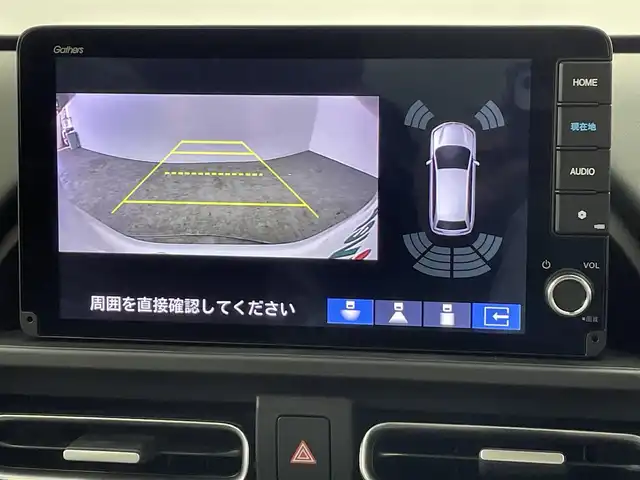 ホンダ フリード ハイブリット e:HEV クロスター 大分県 2025(令7)年 0.1千km プラチナホワイトパール 登録済未使用車/純正９型ナビ　LXM-242ZFNi/（BT/フルセグTV/AppleCarPlay/AndroidAuto)/バックカメラ/ＨｏｎｄａＳＥＮＳＩＮＧ/・衝突軽減ブレーキ/・誤発進抑制機能/・歩行者事故低減ステアリング/・路外逸脱抑制機能/・渋滞追従機能付きアダプティブクルーズコントロール/・車線維持支援システム/・渋滞運転支援機能/・先行車発信お知らせ機能/・オートハイビーム/シートヒーター/両側パワースライドドア/ブラインドスポットインフォメーション/ステアリングリモコン/フォグランプ/電動格納ウィンカーミラー