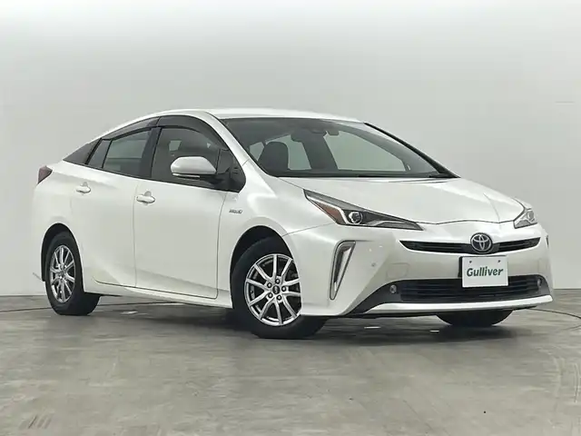 トヨタ プリウス Sツーリングセレクション 福島県 2019(平31)年 6.4万km ホワイトパールクリスタルシャイン セーフティセンスP/・衝突被害軽減ブレーキ/・クルーズコントロール追従あり/・車線逸脱警報装置/・オートマチックハイビーム/ロードサインアシスト/純正ナビゲーションシステム/・フルセグTV/BT/SD/HDMI/USB/CD/DVD/FM/AM/・バックカメラ/・ETC2.0/・前方ドライブレコーダー/革張ステアリング/・ステアリングリモコン/レザーシート/・D+N席シートヒーター/プッシュスタート/・スマートキー/LEDヘッドライト/・フォグライト/・オートライト/電動格納ミラー/・ウィンカーミラー/・オートミラー/社外15インチアルミ/純正フロアマット