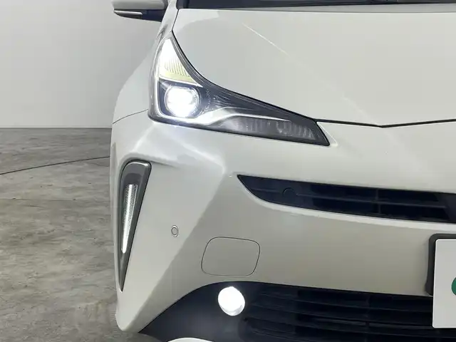 トヨタ プリウス Sツーリングセレクション 福島県 2019(平31)年 6.4万km ホワイトパールクリスタルシャイン セーフティセンスP/・衝突被害軽減ブレーキ/・クルーズコントロール追従あり/・車線逸脱警報装置/・オートマチックハイビーム/ロードサインアシスト/純正ナビゲーションシステム/・フルセグTV/BT/SD/HDMI/USB/CD/DVD/FM/AM/・バックカメラ/・ETC2.0/・前方ドライブレコーダー/革張ステアリング/・ステアリングリモコン/レザーシート/・D+N席シートヒーター/プッシュスタート/・スマートキー/LEDヘッドライト/・フォグライト/・オートライト/電動格納ミラー/・ウィンカーミラー/・オートミラー/社外15インチアルミ/純正フロアマット