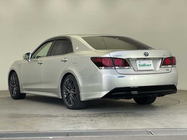 トヨタ クラウン ハイブリッド 栃木県 2015(平27)年 9.6万km シルバー 純正メモリナビ/(CD/DVD/Bluetooth/ワンセグTV/USB)/バックカメラ/ETC/クリアランスソナー/クルーズコントロール/純正アルミホイール/本革シート/パワーシート/シートヒーター/ステアリングヒーター/衝突軽減システム/横滑り防止装置/盗難防止装置/スマートキー/プッシュスタート/電動格納ミラー/フォグランプ/社外フロアマット