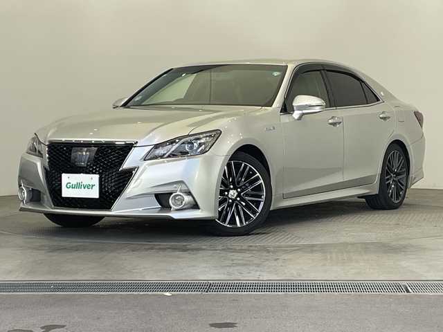 トヨタ クラウン ハイブリッド 栃木県 2015(平27)年 9.6万km シルバー 純正メモリナビ/(CD/DVD/Bluetooth/ワンセグTV/USB)/バックカメラ/ETC/クリアランスソナー/クルーズコントロール/純正アルミホイール/本革シート/パワーシート/シートヒーター/ステアリングヒーター/衝突軽減システム/横滑り防止装置/盗難防止装置/スマートキー/プッシュスタート/電動格納ミラー/フォグランプ/社外フロアマット