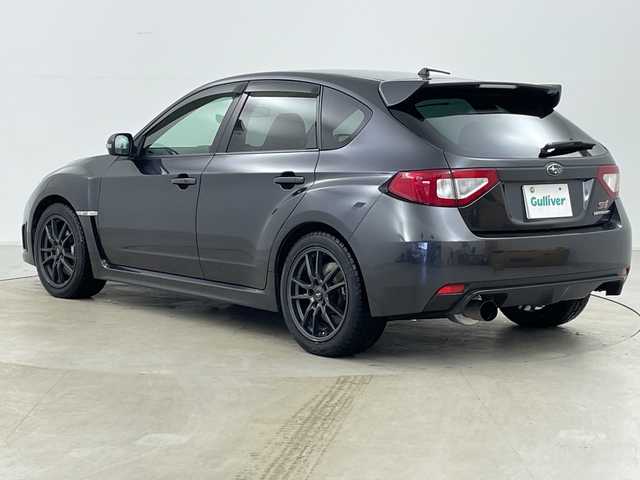 スバル インプレッサ ＷＲＸ STi 道央・札幌 2007(平19)年 13.7万km ダークグレーメタリック ・4WD/・純正エアロ（リア、サイドスポイラー）/・社外マフラー（ノーマル無）/・社外ナビ/・BT&CD/・横滑り防止装置/・SI-DRIVE/・ドライバーズコントロールセンターデフ/・クリフォードセキュリティ/・STI専用ハーフレザーシート/・ETC/・キセノンライト/・プッシュスタート/・スマートキー/・スペアリモコンキー×1/・セキュリティリモコン×1/・保証書/・取扱説明書