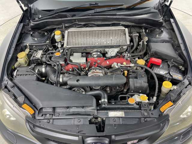 スバル インプレッサ ＷＲＸ STi 道央・札幌 2007(平19)年 13.7万km ダークグレーメタリック ・4WD/・純正エアロ（リア、サイドスポイラー）/・社外マフラー（ノーマル無）/・社外ナビ/・BT&CD/・横滑り防止装置/・SI-DRIVE/・ドライバーズコントロールセンターデフ/・クリフォードセキュリティ/・STI専用ハーフレザーシート/・ETC/・キセノンライト/・プッシュスタート/・スマートキー/・スペアリモコンキー×1/・セキュリティリモコン×1/・保証書/・取扱説明書