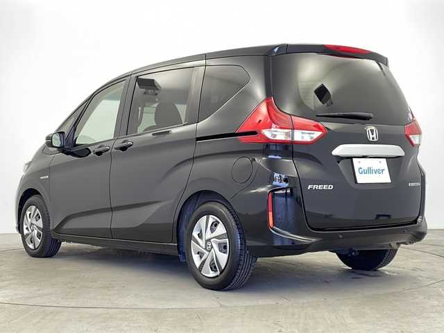 ホンダ フリード ハイブリット G ホンダセンシング 鹿児島県 2021(令3)年 6.5万km クリスタルブラックパール 禁煙車/ホンダセンシング/レーダークルーズコントロール/レーンキープアシスト/衝突軽減ブレーキ/先行車発進警報/標識認識機能/社外ナビ/Bluetooth/CD　/ビルトインETC/バックカメラ/純正フロアマット/両側パワースライドドア/LEDヘッドライト/オートライト/電動格納ミラー/プッシュスタートボタン/スマートキー