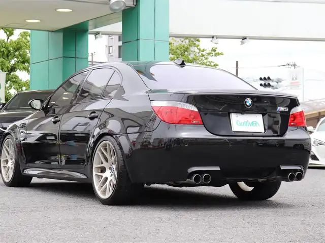 ＢＭＷ Ｍ５ 神奈川県 2006(平18)年 5万km サファイアブラックP サンルーフ/２０インチＡＷ/ビルシュタイン/黒革シート　シートヒーター/ミラーＥＴＣ/ＨＩＤ/クルーズコントロール/前後クリアランスソナー/前席パワーシート/キーレス　プッシュスタート/保証書/取説