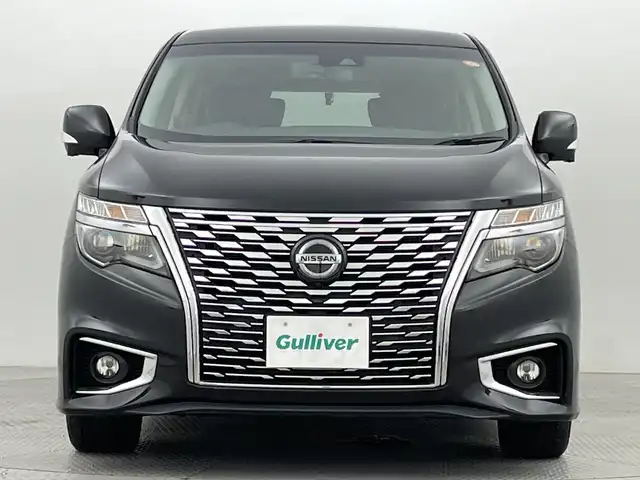 日産 エルグランド 250ハイウェイスター プレミアム 新潟県 2021(令3)年 4万km 黒 インテリジェント エマージェンシーブレーキ/純正フリップダウンモニター/ワンオーナー/純正10インチSDナビ/　　CD/DVD/Blu-ray/フルセグ/BT/SD/アラウンドビューモニター/両側パワースライドドア/パワーバックドア/インテリジェンスクルーズコントロール/LEDオートライト/レザーシート/オットマン/前席パワーシート/前席シートヒーター/純正18インチアルミホイール付/リアオートエアコン/リアサンシェード/デジタルインナーミラー/ブラインドスポットモニター/エンジンスタータ/スペアキー/スマートキー/ETC