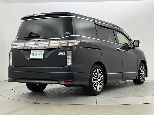 日産 エルグランド 250ハイウェイスター プレミアム 新潟県 2021(令3)年 4万km 黒 インテリジェント エマージェンシーブレーキ/純正フリップダウンモニター/ワンオーナー/純正10インチSDナビ/　　CD/DVD/Blu-ray/フルセグ/BT/SD/アラウンドビューモニター/両側パワースライドドア/パワーバックドア/インテリジェンスクルーズコントロール/LEDオートライト/レザーシート/オットマン/前席パワーシート/前席シートヒーター/純正18インチアルミホイール付/リアオートエアコン/リアサンシェード/デジタルインナーミラー/ブラインドスポットモニター/エンジンスタータ/スペアキー/スマートキー/ETC