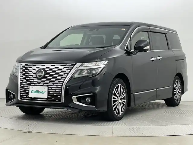 日産 エルグランド 250ハイウェイスター プレミアム 新潟県 2021(令3)年 4万km 黒 インテリジェント エマージェンシーブレーキ/純正フリップダウンモニター/ワンオーナー/純正10インチSDナビ/　　CD/DVD/Blu-ray/フルセグ/BT/SD/アラウンドビューモニター/両側パワースライドドア/パワーバックドア/インテリジェンスクルーズコントロール/LEDオートライト/レザーシート/オットマン/前席パワーシート/前席シートヒーター/純正18インチアルミホイール付/リアオートエアコン/リアサンシェード/デジタルインナーミラー/ブラインドスポットモニター/エンジンスタータ/スペアキー/スマートキー/ETC