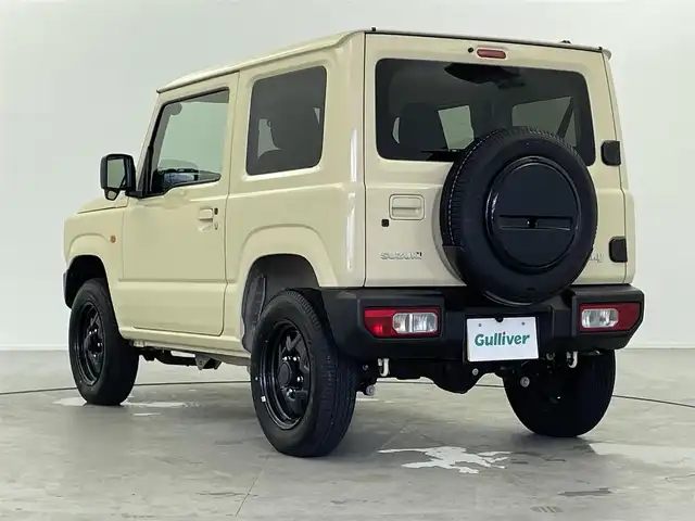 スズキ ジムニー XL 福井県 2024(令6)年 1.1万km シフォンアイボリーM ４WD/社外７インチディスプレイオーディオナビ/Bluetooth/USB/AUX/AM/FM/バックカメラ /衝突軽減ブレーキ//シートヒーター /電動格納式ミラー/プッシュスタート /オートライト /ライトレベライザー /フォグランプ/背面タイヤ/ETC/社外フロアマット