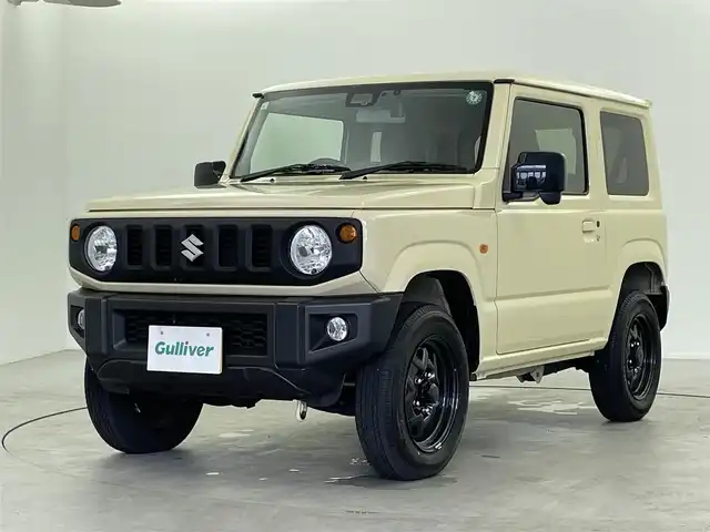 スズキ ジムニー XL 福井県 2024(令6)年 1.1万km シフォンアイボリーM ４WD/社外７インチディスプレイオーディオナビ/Bluetooth/USB/AUX/AM/FM/バックカメラ /衝突軽減ブレーキ//シートヒーター /電動格納式ミラー/プッシュスタート /オートライト /ライトレベライザー /フォグランプ/背面タイヤ/ETC/社外フロアマット