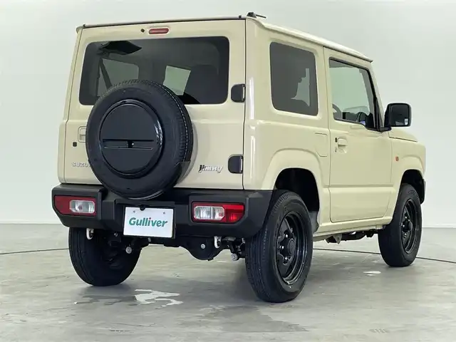 スズキ ジムニー XL 福井県 2024(令6)年 1.1万km シフォンアイボリーM ４WD/社外７インチディスプレイオーディオナビ/Bluetooth/USB/AUX/AM/FM/バックカメラ /衝突軽減ブレーキ//シートヒーター /電動格納式ミラー/プッシュスタート /オートライト /ライトレベライザー /フォグランプ/背面タイヤ/ETC/社外フロアマット
