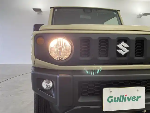 スズキ ジムニー XL 福井県 2024(令6)年 1.1万km シフォンアイボリーM ４WD/社外７インチディスプレイオーディオナビ/Bluetooth/USB/AUX/AM/FM/バックカメラ /衝突軽減ブレーキ//シートヒーター /電動格納式ミラー/プッシュスタート /オートライト /ライトレベライザー /フォグランプ/背面タイヤ/ETC/社外フロアマット