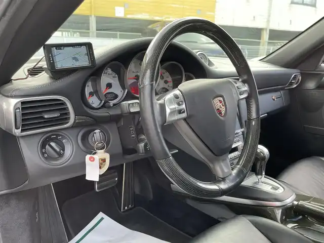 ポルシェ ９１１ ターボ 和歌山県 2007(平19)年 2.8万km 黒 ターボ/スポーツクロノパッケージ/カーボンインテリアトリム/Panasonicナビ/（フルセグTV/HDDMUSIC/CD/DVD/AM/FM/SD-Audio/VTR）/carrozzeria ウーファー/可動式リアウィング/純正20インチAW/スーパーキャットレーダー/記録簿（H19.H21.H22.H24.H25.H26.H28.H30.H31.R2.R4.R6)/純正フロアマット/シートヒーター　D/N/レザーシート/スペアキー×１/保証書/取扱説明書