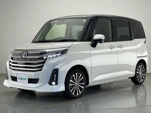 トヨタ ルーミー カスタムG－T 愛知県 2025(令7)年 0.1千km ブラックマイカメタリック/パールホワイト2トーン 登録済未使用車/走行距離１０km/純正９インチディスプレイオーディオ/スマートアシストIII/コンフォートパッケージ/HDMI/パノラミックビューモニター/レーダークルーズコントロール/シートヒーター/パーキングセンサー/両側パワースライドドア/ETC/フルセグTV/LEDオートライト/フォグランプ/純正アルミホイール/純正フロアマット/衝突被害軽減ブレーキ/禁煙車
