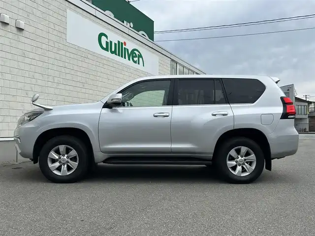 トヨタ ランドクルーザー プラド TX Lパッケージ 山形県 2018(平30)年 14.3万km シルバーM ４WD/純正ナビ/（FM/AM/DVD/フルセグ）/Bluetooth/クルーズコントロール/バックカメラ/横滑り防止装置/ドライブレコーダー/ヒートヒーター/エアシート/逸脱防止装置/オートライト/フォグランプ/純正マット/冬タイヤ積載/ダブルエアバック/保証証/取扱説明書