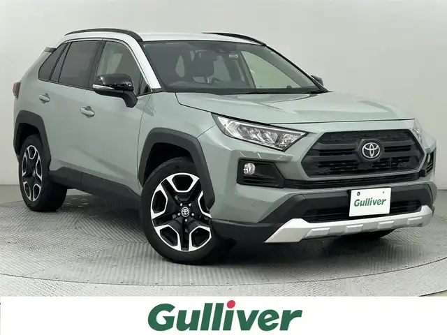 トヨタ ＲＡＶ４ アドベンチャー 道央・札幌 2019(令1)年 3.8万km アッシュグレーメタリック/アーバンカーキ ・４WD/・純正SDナビ/・CD/DVD/SD/BT/フルセグ/・バックカメラ/・ビルトインETC2.0/・ドライブレコーダー/・防眩ミラー/・トヨタセーフティセンス/・プリクラッシュセーフティ/・レーンキープアシスト/・レーダークルーズコントロール/・クリアランスソナー/・横滑り防止装置/・オートライト/・オートマチックハイビーム/・レザーシート/・D席パワーシート/・ドアバイザー/・純正19インチAW/・純正フロアマット/・プッシュスタート/・スマートキー/・保証書